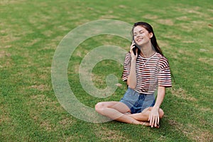 tree woman phone palm beautiful nature lifestyle grass smiling blogger park happy