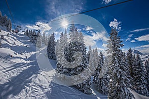 Trees covered by fresh snow in Kitzbuehel ski resort, Tyrol, Austria photo
