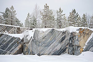 Trees, growing on rocks Marble quarry, january day. Ruskeala, Karelia