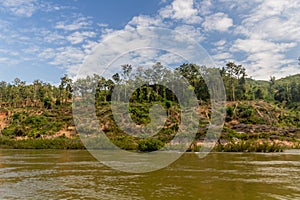 Trees are removed due to increasing levels of Nam Ou river during Nam Ou 3 dam filling, La