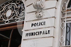 Treet police municipale means in french Municipal police sign of local police in old ancient building in France