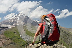 Treking for the Kazbek peak in the mountains of the Caucasus photo