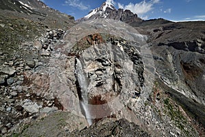 Treking for the Kazbek peak in the mountains of the Caucasus photo