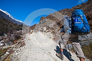 Trekker approaching Renjo La pass on a way to Everest Base camp