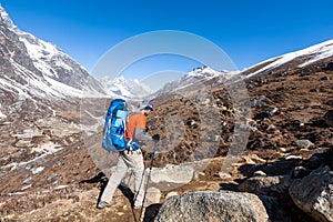 Trekker approaching Renjo La pass on a way to Everest Base camp