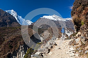 Trekker approaching Renjo La pass on a way to Everest Base camp