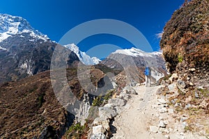 Trekker approaching Renjo La pass on a way to Everest Base camp