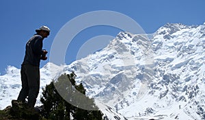 Trekker In Front Of Nanga Parbat photo