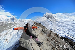 Trekker on glacier beside of everest basecamp from everest trek