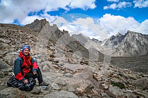 Trekker in the mountain valley near Mount Kailash