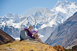 Trekker rests on Manaslu circuit trek in Nepal