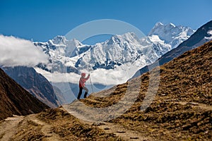 Trekker rests on Manaslu circuit trek in Nepal