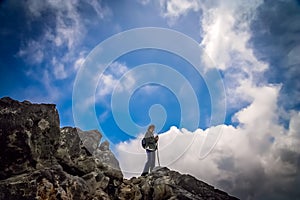 Trekker on top of a mountain