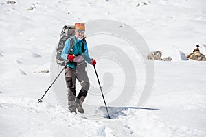 Trekker is walking by Renjo La pass in Everest region