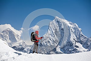 Trekker is walking by Renjo La pass in Everest region