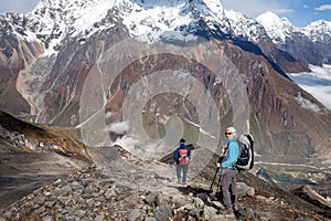 Trekker on the way to the valley covered with cloud on Manaslu c