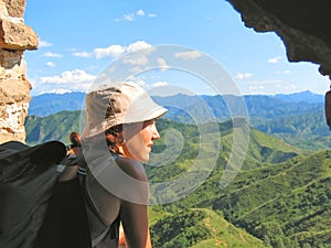 A trekker woman with a hat photo