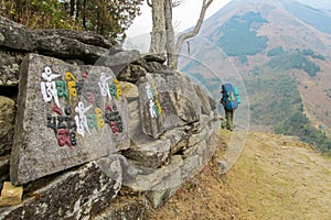 Trekkers on a hiking trail in Himalaya mountains