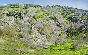 Trekkers resting beside Cornalvo Natural Park track, Extremadura, Spain