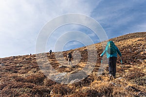 Trekkers walk up on hill in Mera region for acclimatization, Himalaya mountain range in Nepal