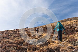 Trekkers walk up on hill in Mera region for acclimatization, Himalaya mountain range in Nepal photo