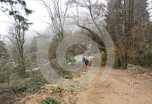 Very cold winter day trekking in the mountains photo