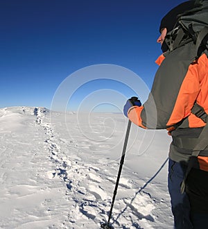 Trekking man in winter