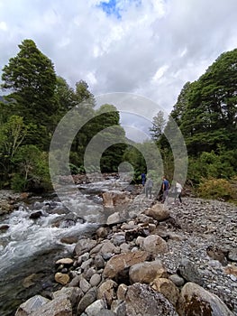 Trekking in Puerto AysÃÂ©n, Patagonia, Chile. River forest, and clouds photo