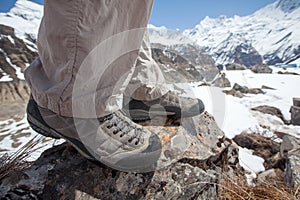 Trekking shoes in mountains closeup