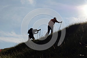 Trekking silhouettes photo