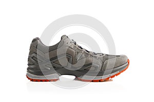 Trekking sneaker with red sole, isolated on white