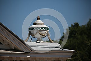 Trellis arbor. Lower Park, Peterhof. Decorative vase on the roof of the pavilion, close-up