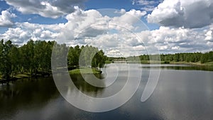 Tremendous river separates green dense forests aerial view