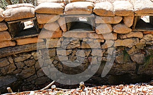 trench loophole on the war front line with sandbags for army protection photo