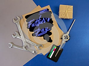 Trend greeting card, online banner on Father`s Day with a blue neon sign photo