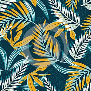 Trend seamless pattern with bright tropical leaves and plants on a dark background. Vector design. Jung print. Floral background.