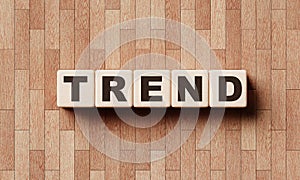 TREND wooden word block cubes with laminate background. Fashion and popular concept. 3D illustration rendering