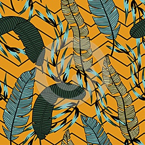 Trendy abstract seamless pattern with colorful tropical leaves and flowers on an orange background. Vector design. Jungle print. F photo