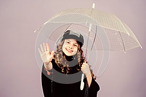 Trendy beauty. rain protection. Rainbow. happy little girl with transparent umbrella. autumn fashion. little girl in