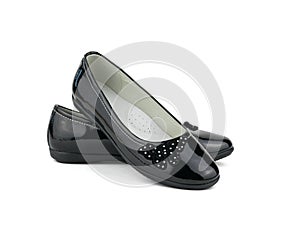 Trendy black leather women`s slim shoes isolated on white background.