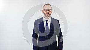 Trendy businessman in suit posing showing disagree gesturing. Medium shot on RED camera