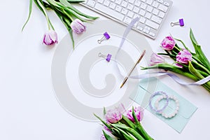 Trendy design of workdesk with blossom on white background top view mock-up