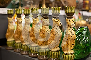 Trendy exotic animal shaped ceramic candlesticks, sconces, Arte Deco style home decoration concept, selective focus photo