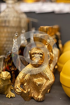 Trendy exotic golden animal shaped ceramic candlesticks, sconces, Arte Deco style home decoration, selective focus photo