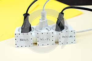 Trendy flat lay minimal concept, unplugged cord with word work, media, wi-fi