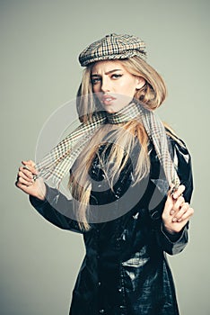 Trendy girl with makeup on sensual face. Beauty and hairdresser. woman with stylish long hair in leather coat