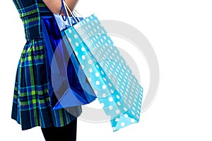 Trendy girl with shopping bags, cropped image