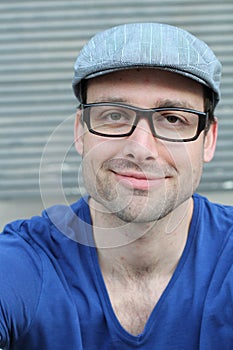 Trendy good looking young man smiling