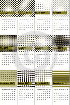Trendy green and tundora colored geometric patterns calendar 2016