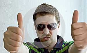 Trendy guy showing ok sign